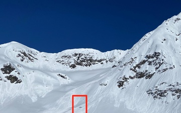 Alaska Army National Guard HH-60 hoists injured backcountry skier off Girdwood mountainside