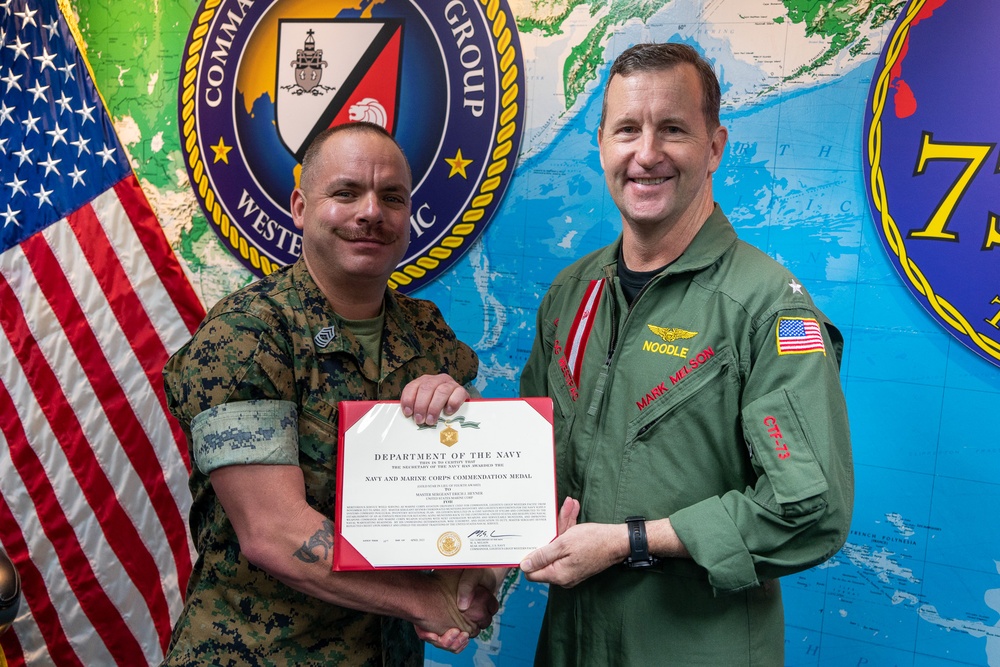 Master Sgt. Heyner Receives Award From COMLOG WESTPAC