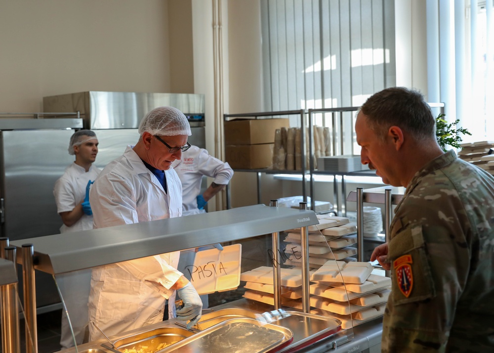 Celebrity Chef Robert Irvine Visits Camp Kosciuszko