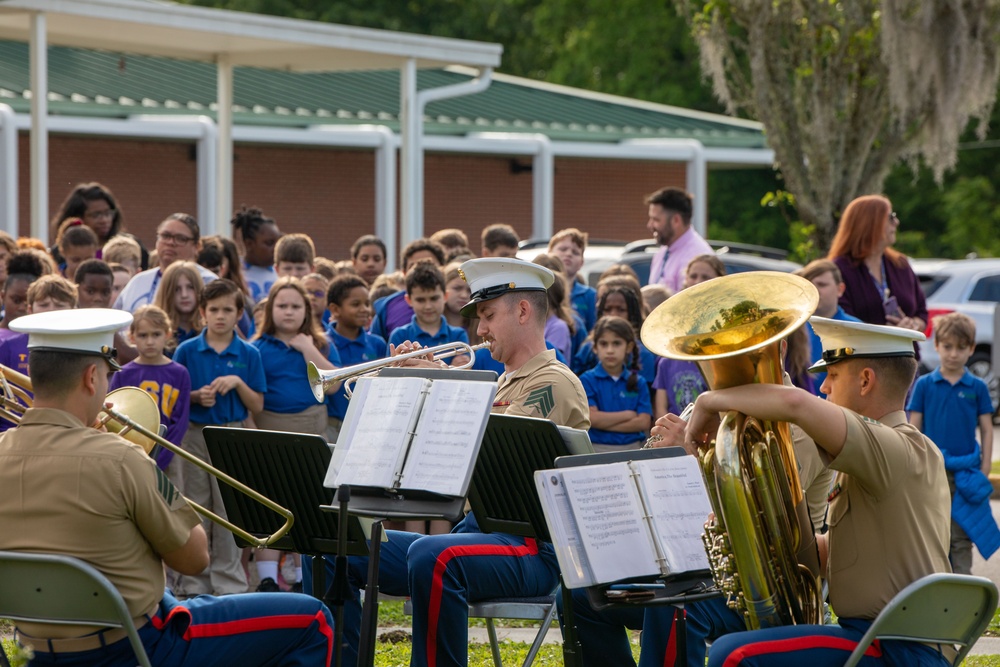 MARFORRES Marines Unfurl American Flag at Local Elementary School