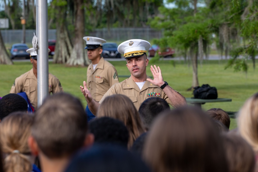 MARFORRES Marines Unfurl American Flag at Local Elementary School