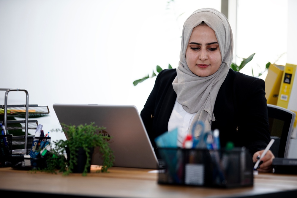 Maryam, 24, works in the USAID-funded WorkWell Program