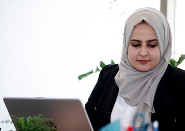 Maryam, 24, works in the USAID-funded WorkWell Program