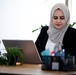 Maryam, 24, works in the USAID-funded WorkWell Program