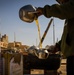 A tea vendor pours tea at his stand in Sebha, Libya