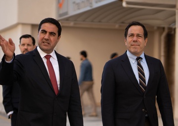 USAID Country Representative John Cardenas and Deputy Director Nathan Park visit the  High National Election Commission.