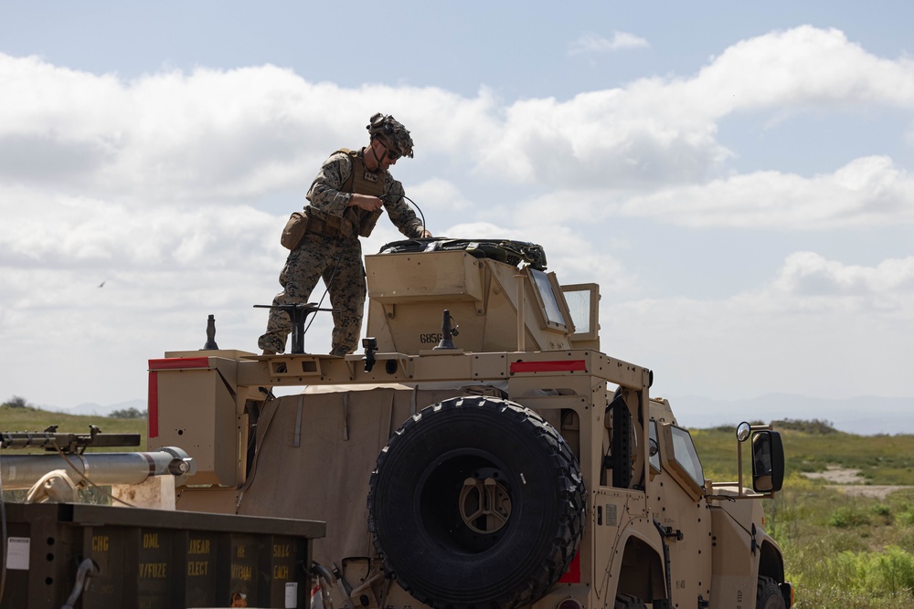 Combat engineers train to employ assault breaching charges