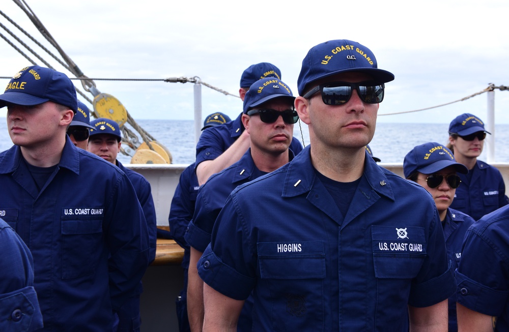 Coast Guard officer candidates, USCGC Eagle personnel muster for quarters while underway in the Atlantic Ocean