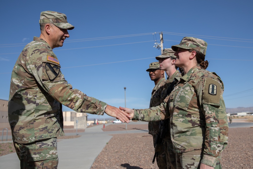 197th Field Artillery Brigade Commander awards soldiers from the 3-197th FAR