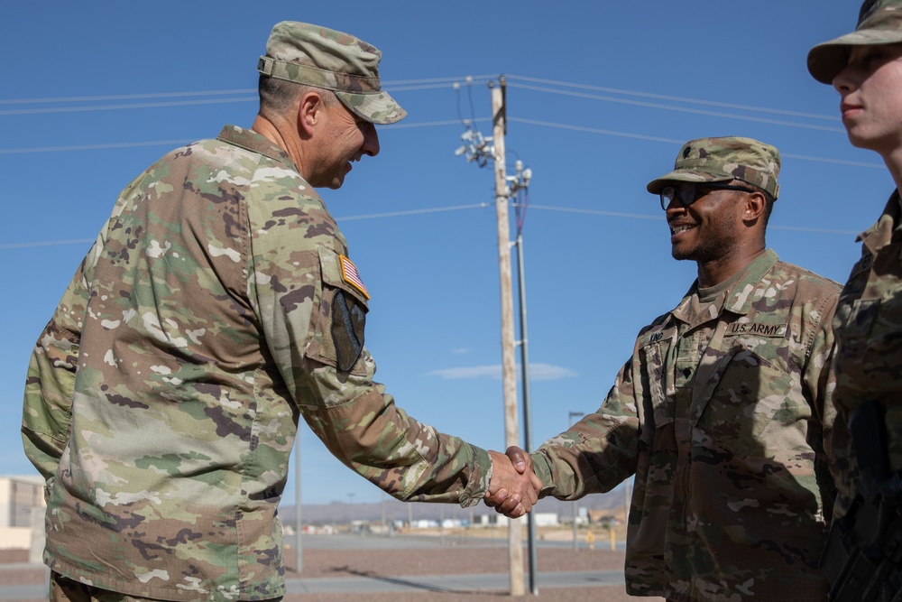 197th Field Artillery Brigade Commander awards soldiers from the 3-197th FAR