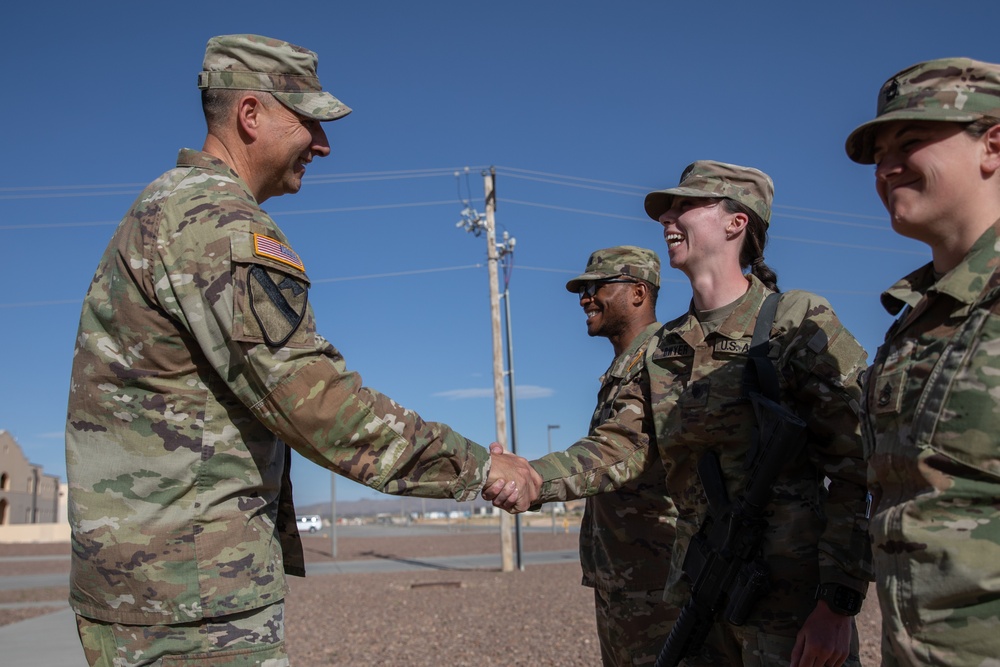 197th Field Artillery Brigade Commander awards soldiers from the 3-197th FAR