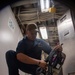 U.S. Navy Sailor Checks Fire Fighting Equipment