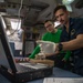 U.S. Navy Sailors Calibrate A Caliper