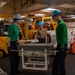 U.S. Navy Sailors Move An Aircraft Transmitter