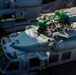 Sailors Perform Maintenance On Helicopter