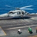 Helicopter Lifts Off From Flight Deck