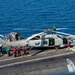 Sailors Prepare Helicopter For Transport