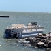 Coast Guard assists 2 aboard grounded vessel near Freeport, Texas
