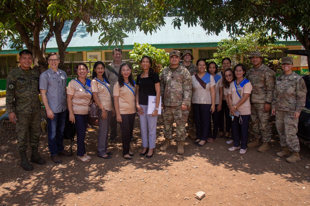 Balikatan 23 | U.S Army Soldiers with USAID representatives tour schools in Fort Magsaysay, Philippines