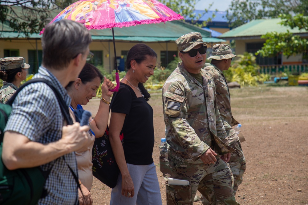 Balikatan 23 | U.S Army Soldiers with USAID representatives tour schools in Fort Magsaysay, Philippines