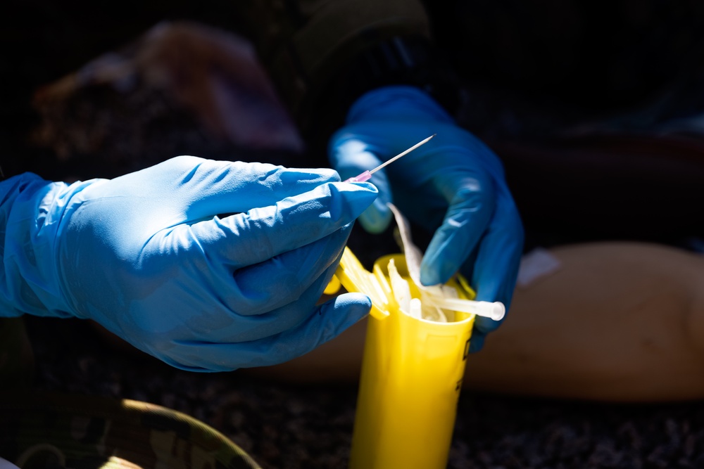Corpsmen and Australian Defence Force Soldiers participate in Tactical Combat Casualty Care exercise