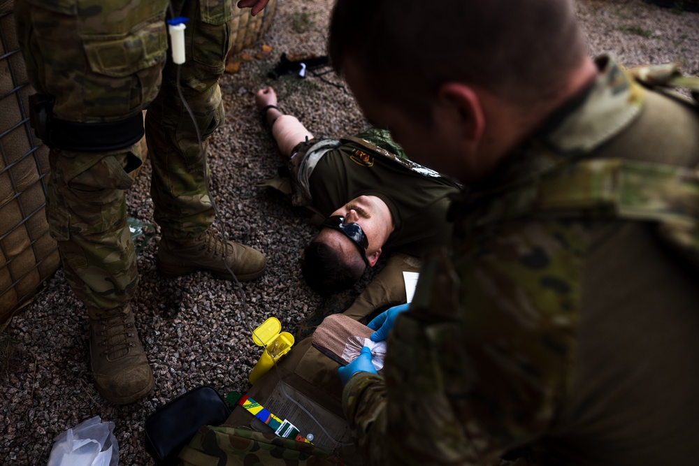 Corpsmen and Australian Defence Force Soldiers participate in Tactical Combat Casualty Care exercise