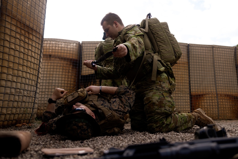 Corpsmen and Australian Defence Force Soldiers participate in Tactical Combat Casualty Care exercise