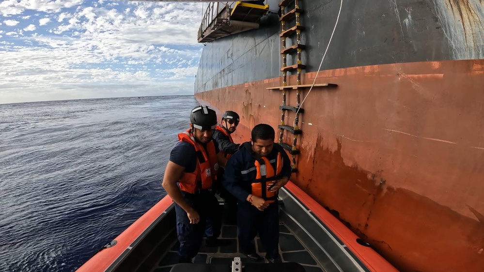 U.S. Coast Guard Cutter Joseph Gerczak assists two Ecuadorian SAR survivors