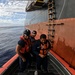 U.S. Coast Guard Cutter Joseph Gerczak assists two Ecuadorian SAR survivors