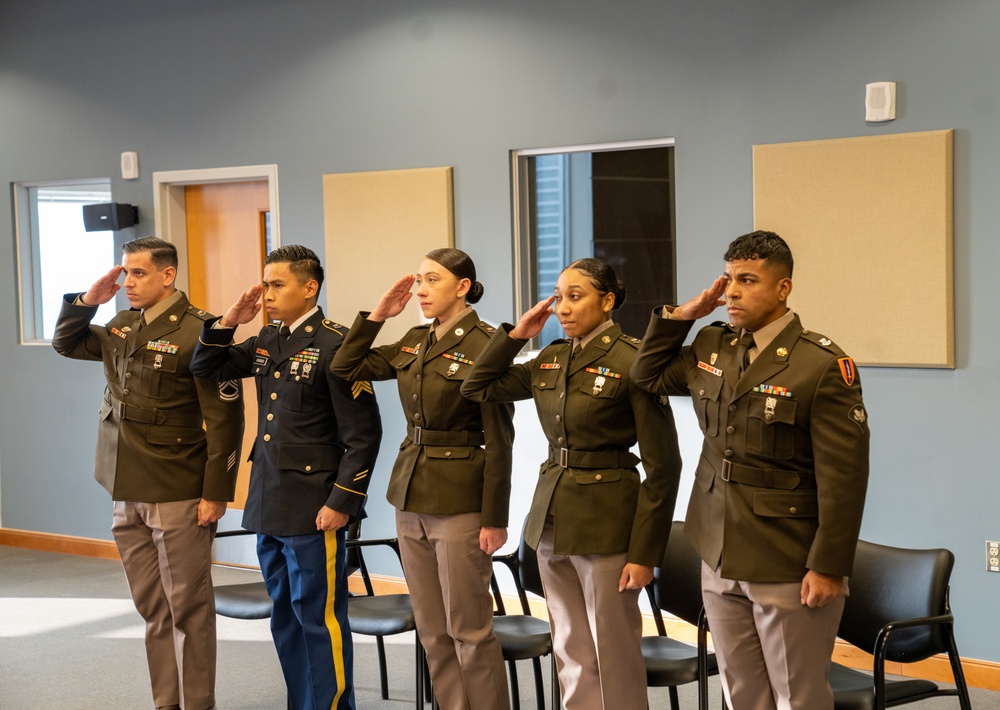 Soldiers from the Best Signal Squad competition go to the board.