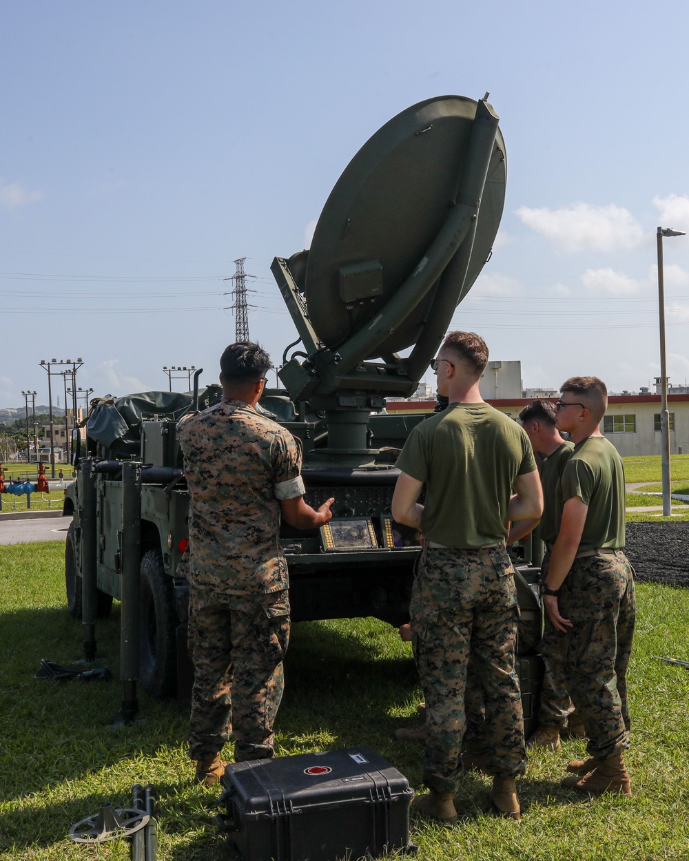 Communication Co. Marines set-up satellite communication for Task Force 76/3