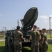 Communication Co. Marines set-up satellite communication for Task Force 76/3