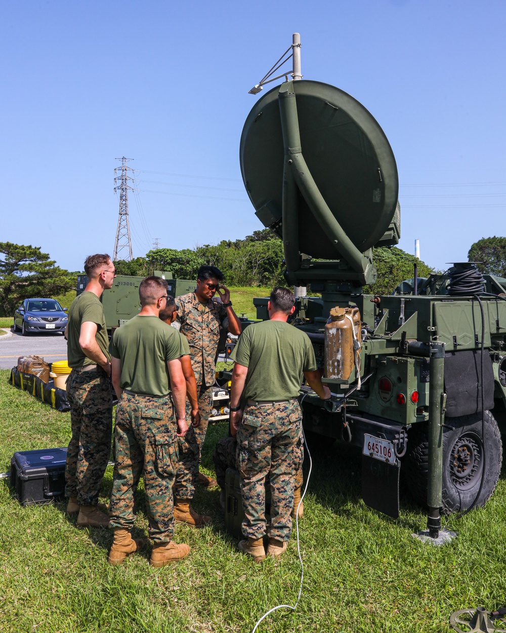 Communication Co. Marines set-up satellite communication for Task Force 76/3