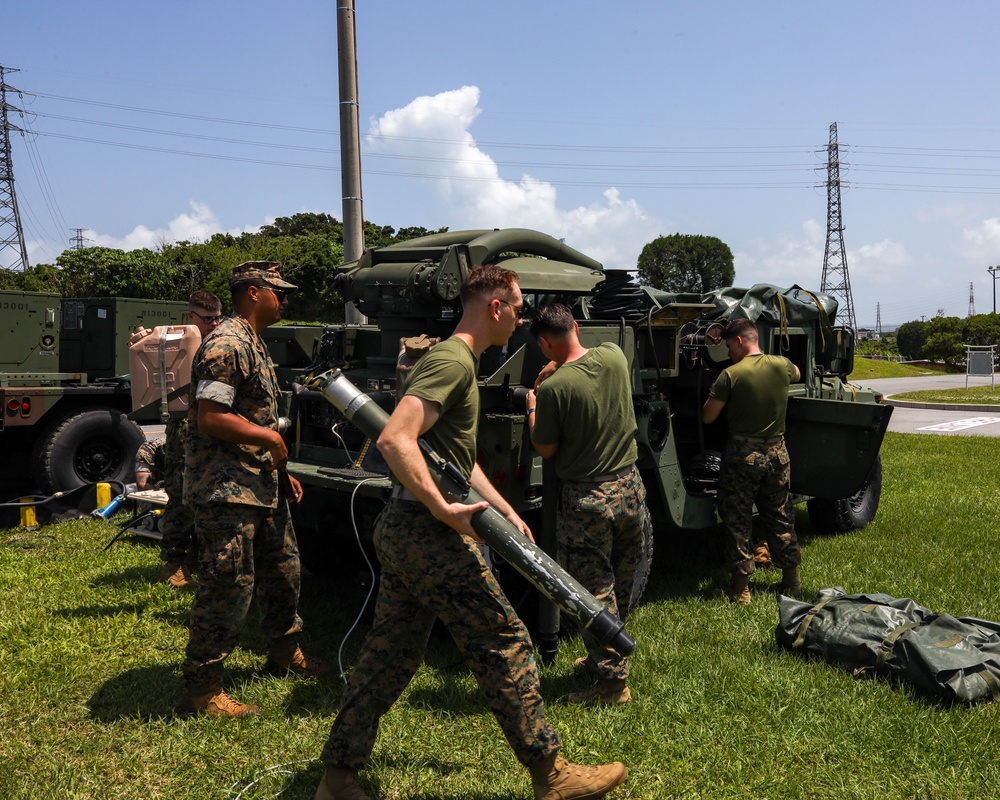 Communication Co. Marines set-up satellite communication for Task Force 76/3