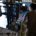 Aerial Port Airmen move equipment with forklift