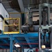 Aerial Port Airmen move equipment with forklift