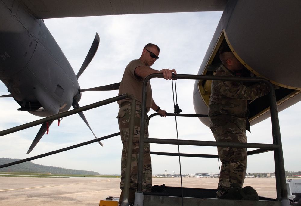 Airmen inspect MC-130J Commando II refueling pod