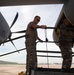 Airmen inspect MC-130J Commando II refueling pod