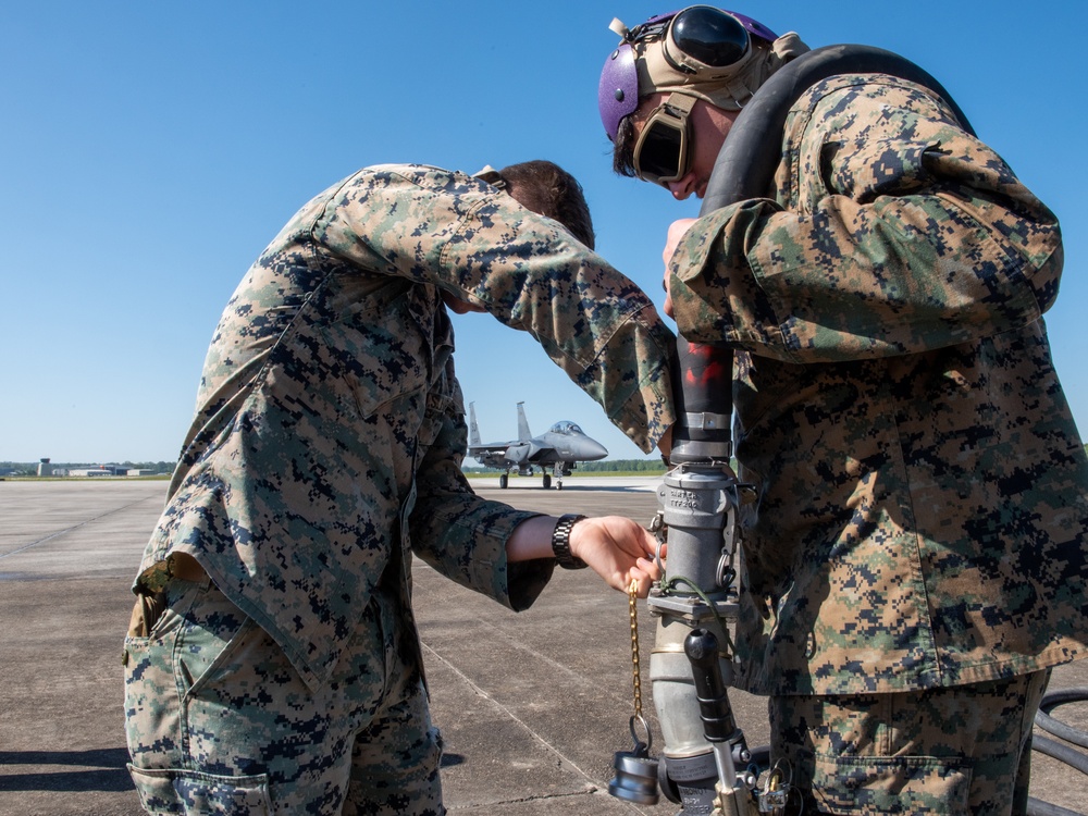 Marines conduct Hot Pit with Strike Eagle