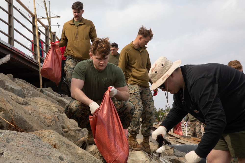 Headquarters Battalion cleans the beach