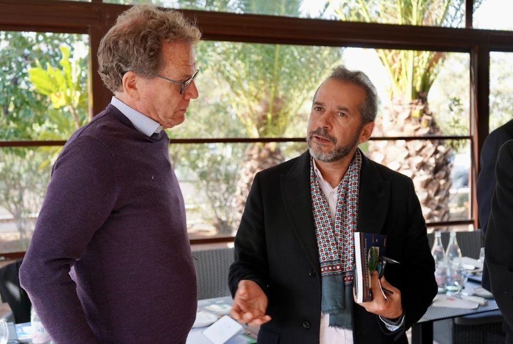 USAID/Tunisia Mission Director Scott Dobberstein Talks with a Tunisian Entrepreneur