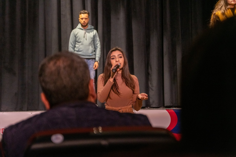 A young Tunisian woman singing during the inauguration ceremony of the newly refurbished Cultural Center Hammouda Maali el Kram