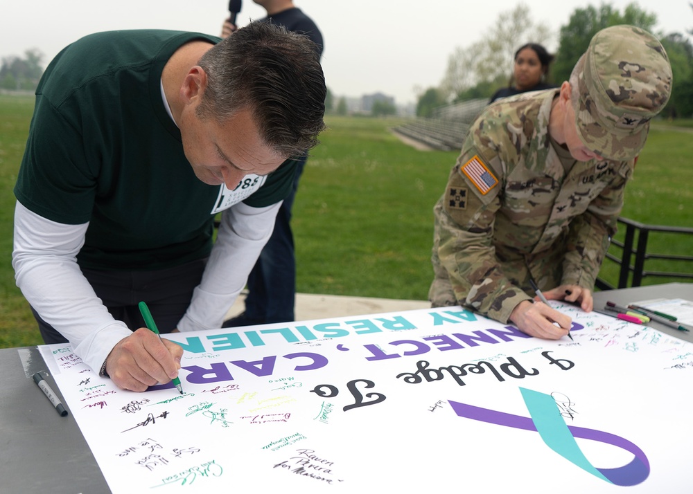 70th ISRW Airmen increase Suicide Awareness through unified walk