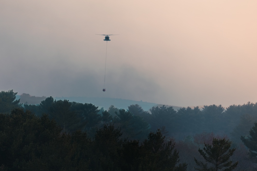 RI National Guard employs aerial firefighting capability for the first time during historic brushfire