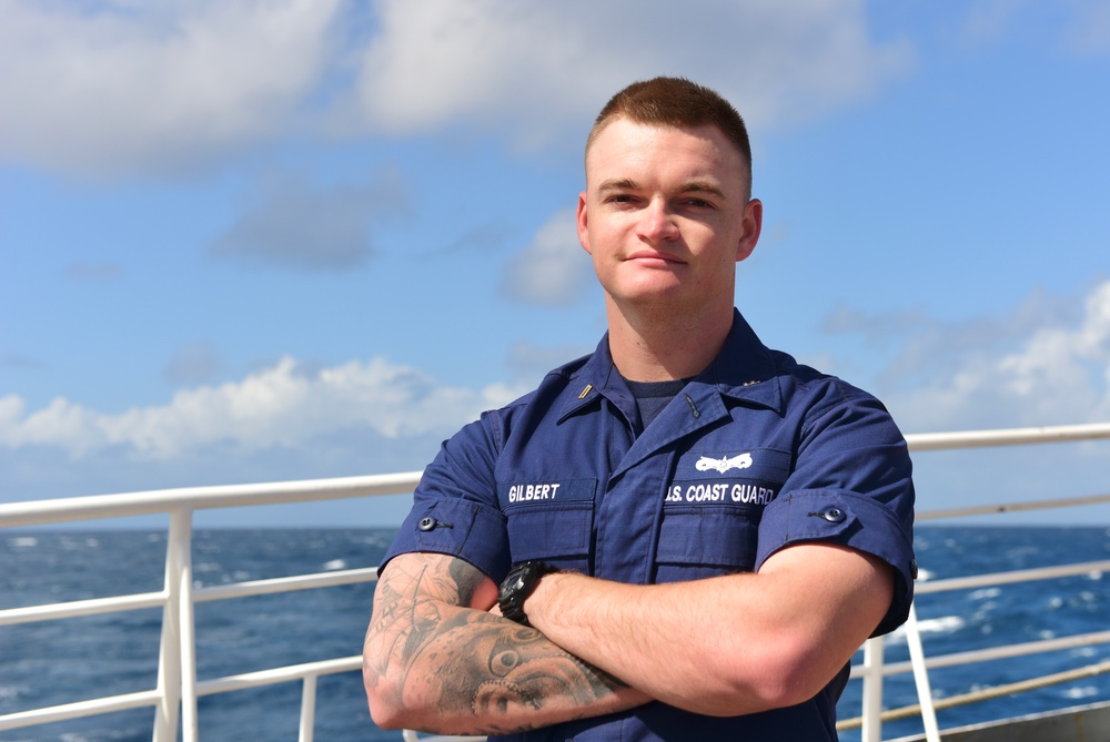 Coast Guard officer candidate poses for a photo aboard USCGC Eagle in the Atlantic Ocean