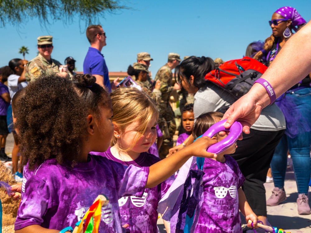 Luke CDC hosts Purple Up parade