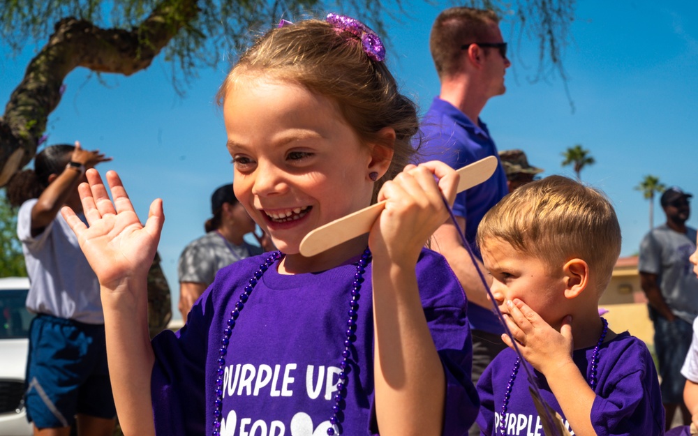 Luke CDC hosts Purple Up parade