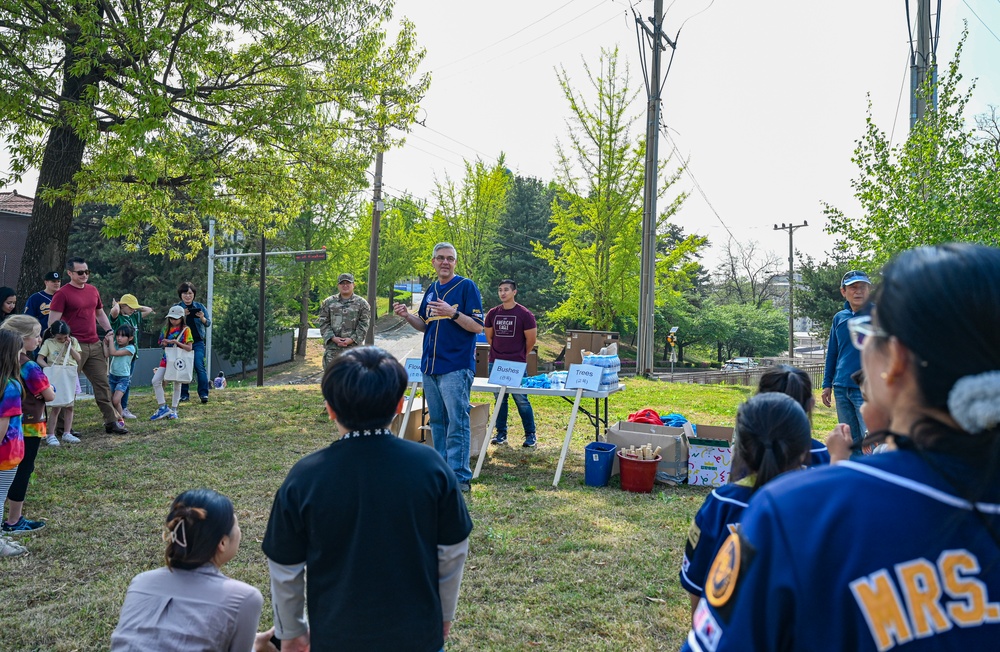 Osan Elementary plants trees for Earth Day