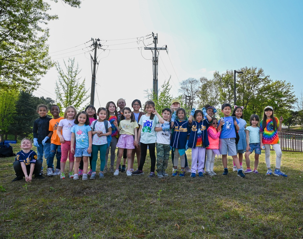 Osan Elementary plants trees for Earth Day