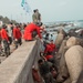 US Marines, Republic of Korea Marines and Sailors, and local community volunteers help clean the earth